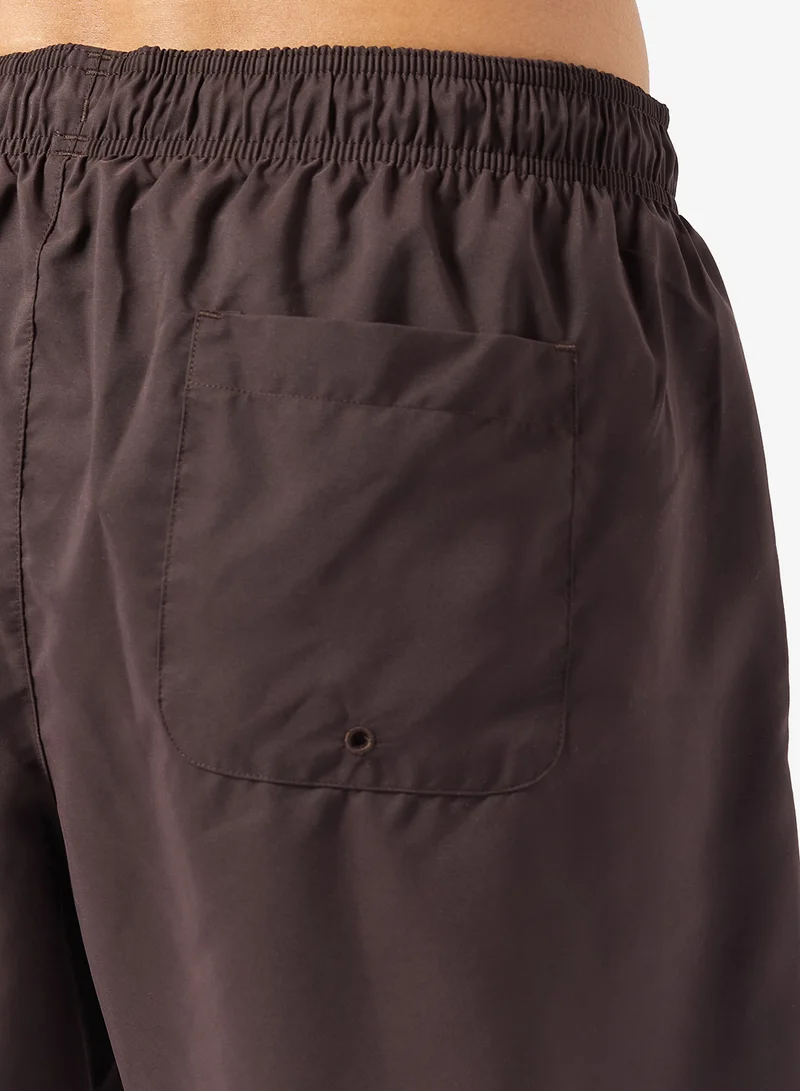 LACOSTE  Monochrome Swim Trunks for Men | Best Price UAE